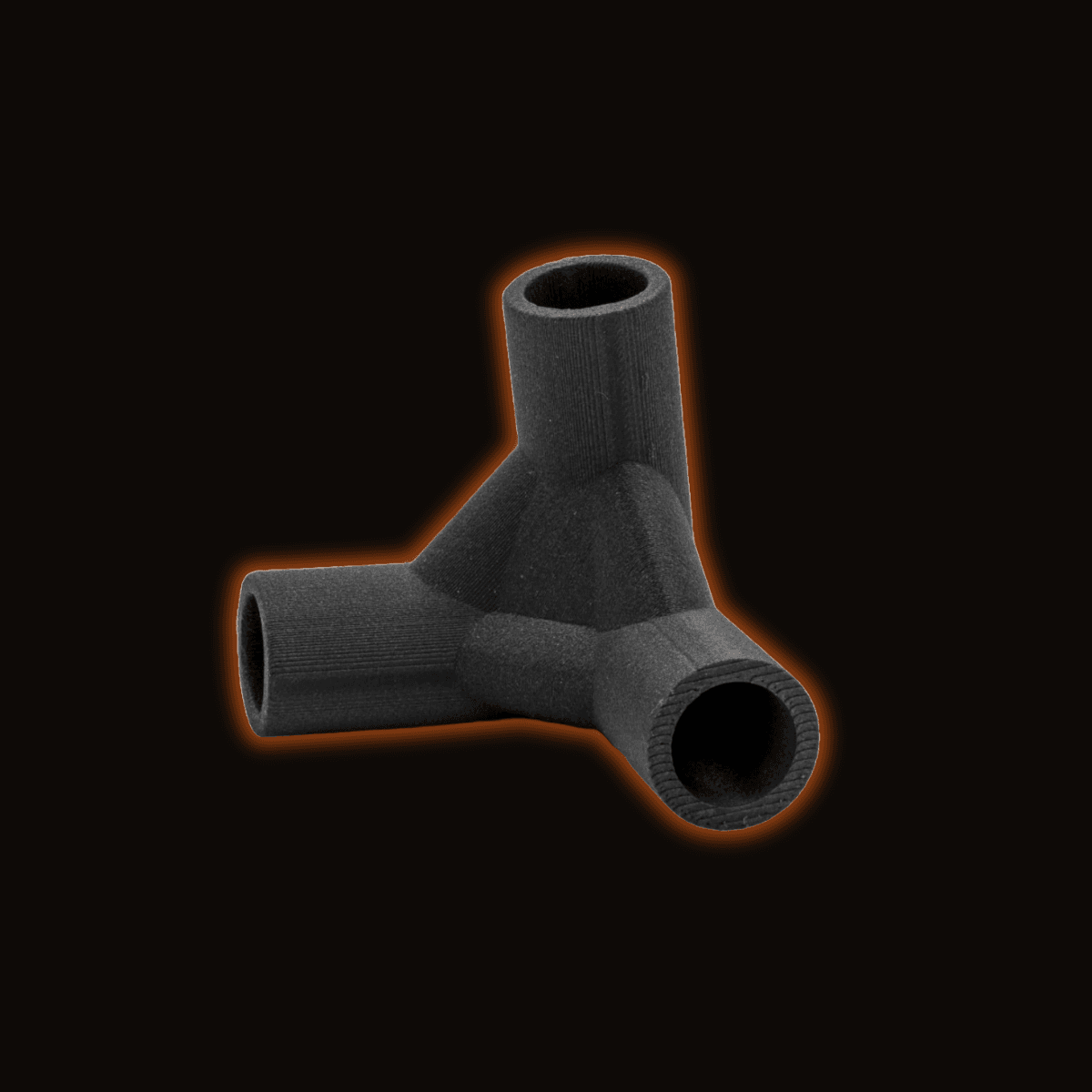 PET-CF part against a dark studio background